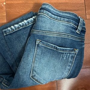 Distressed skinny jeans. Very comfortable, stretchy denim. Worn once or twice